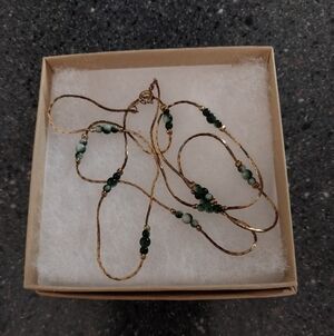 29 Inch Vintage Necklace Gold With Green And White Marbled Beads.